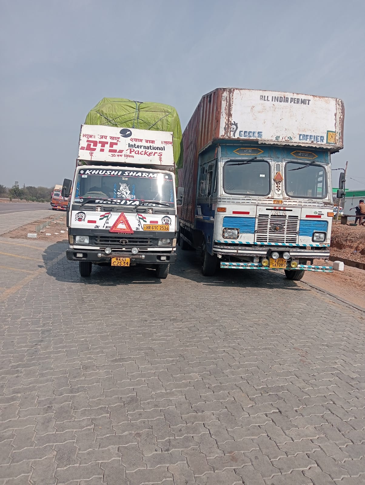 DTC International Packers DTC vehicles at site